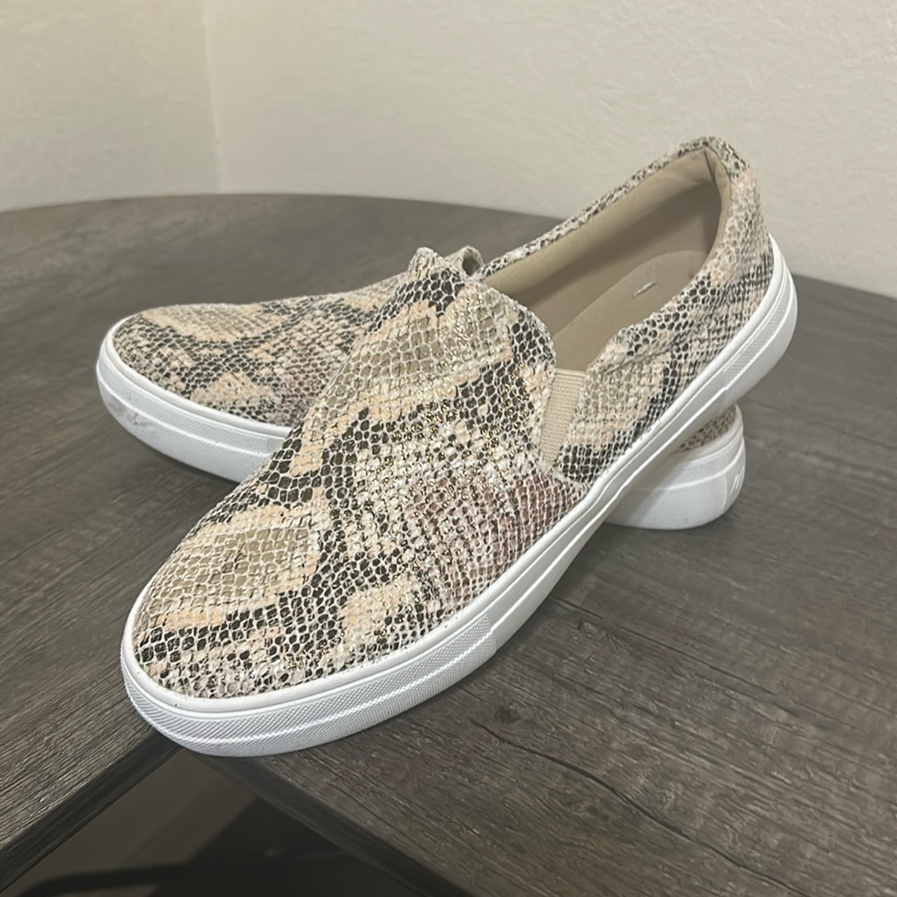 Steve Madden slip on shoes.